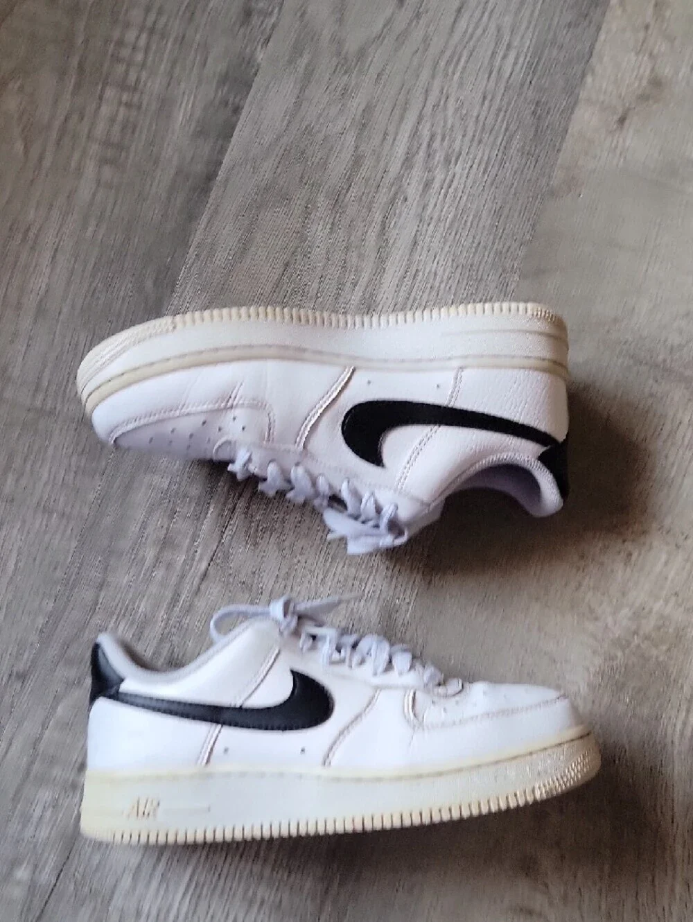 Women's 6.5 Nike White Sneakers with Black Swoosh